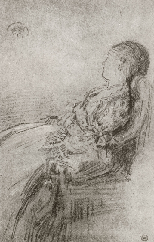 Young woman sitting in an armchair